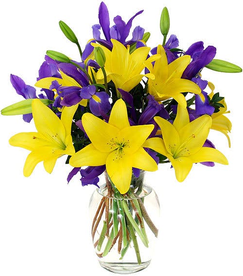Iris Lily Purple iris, yellow lilies in a glass vase Bagoy's Florist