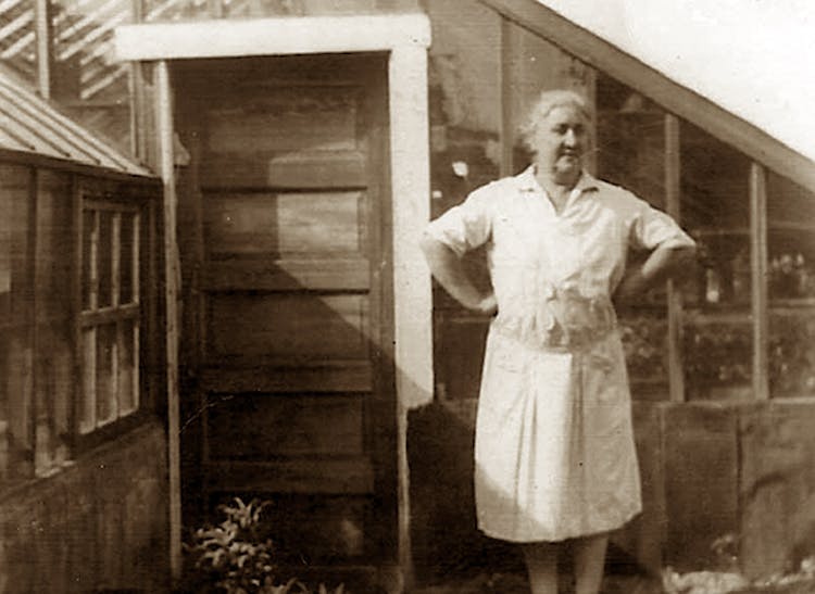 Marie Bagoy supervises an early greenhouse in the mid-1920s